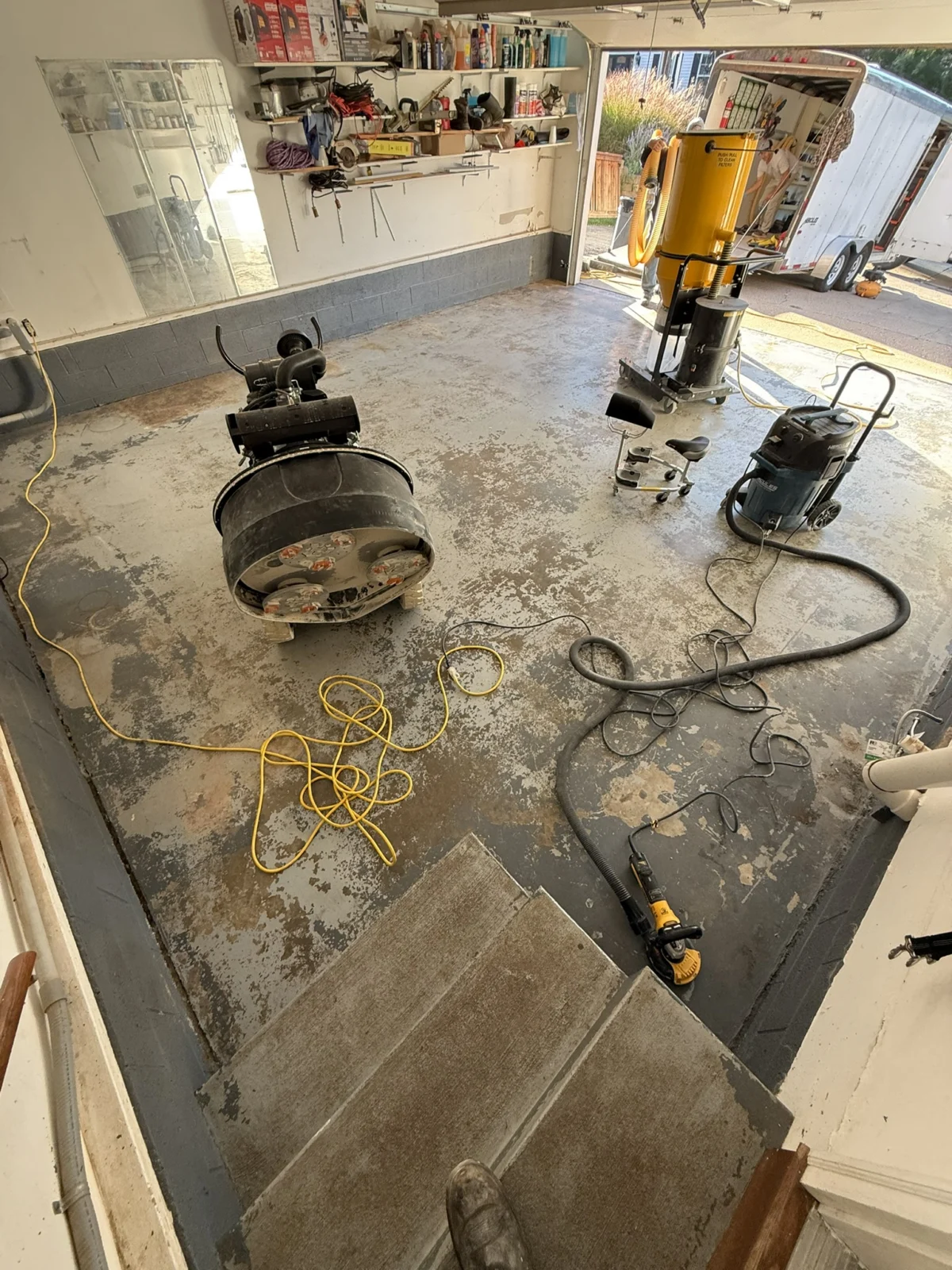 Widespread failed coating across the 458 sq. ft. Charleston garage before professional resurfacing.