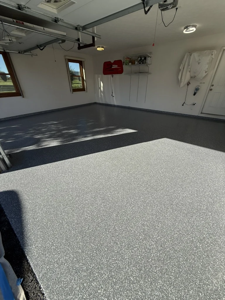 Completed 500-square-foot garage floor viewed from the entrance