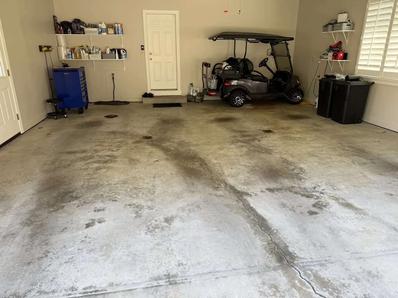 Before / preparation — worn garage floor before coating