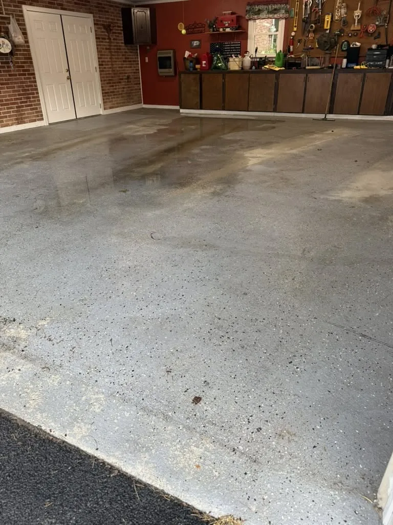 Before / preparation — garage floor before the new finish