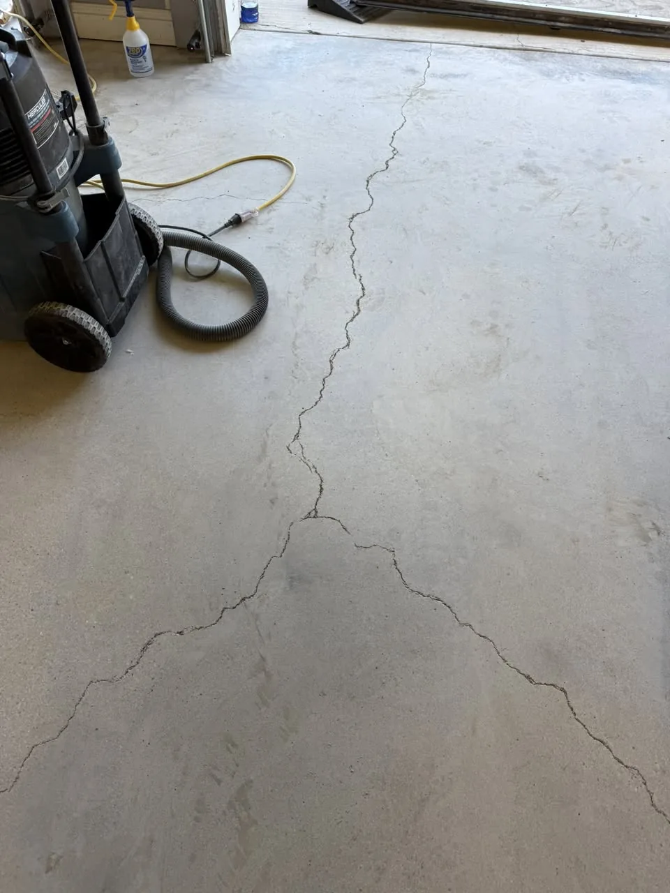 Before / preparation — visible slab cracking
