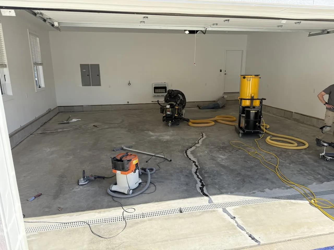 Before / preparation — slab with preparation equipment and visible cracks
