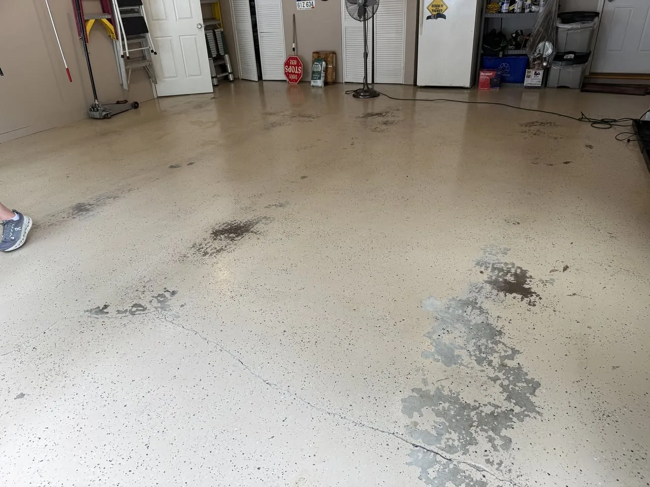 Beckley garage with its failed existing floor coating before the Epoxy King installation
