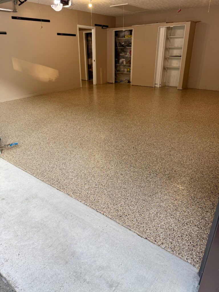 The same Beckley garage after preparation and installation of an Outback decorative-flake floor