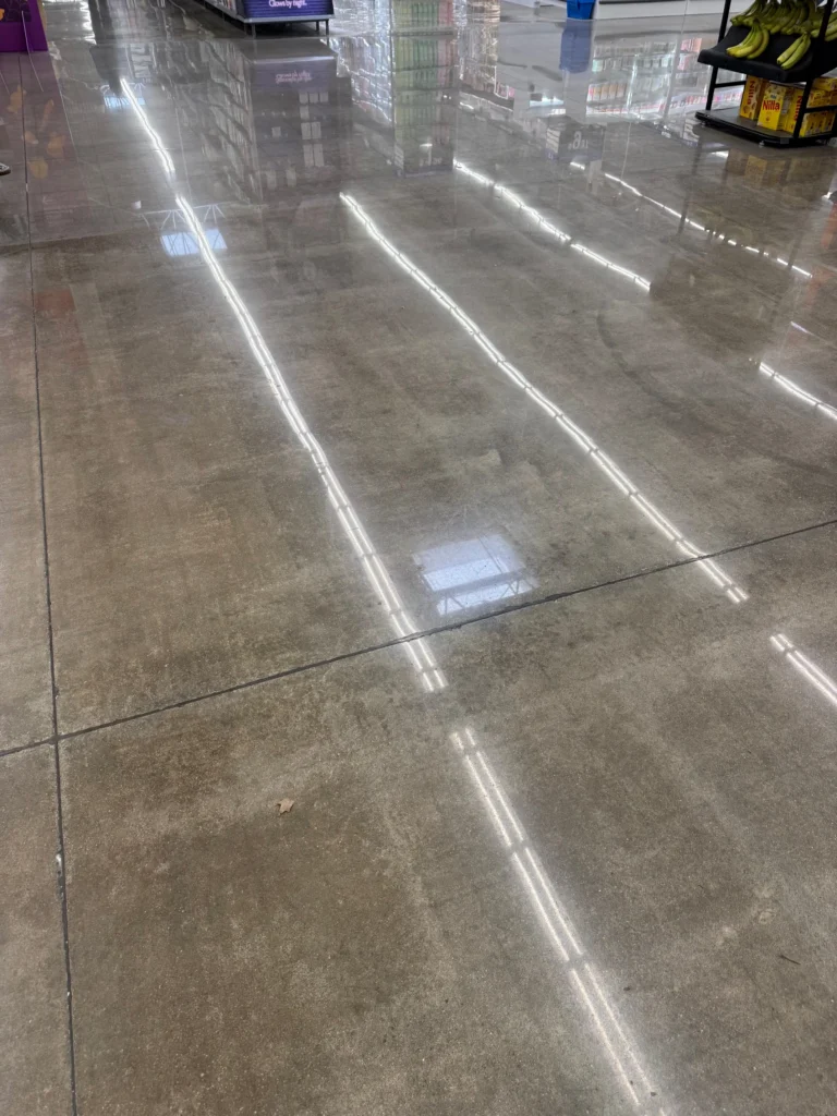 Polished concrete floor with visible joints in a retail setting